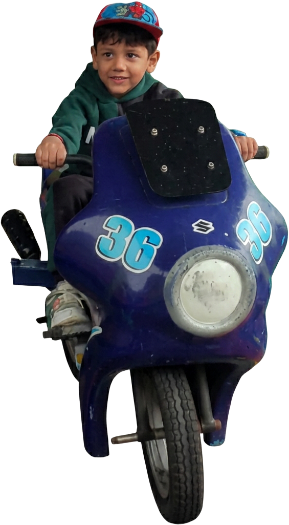 Aditya riding a bike, taking off into the sky